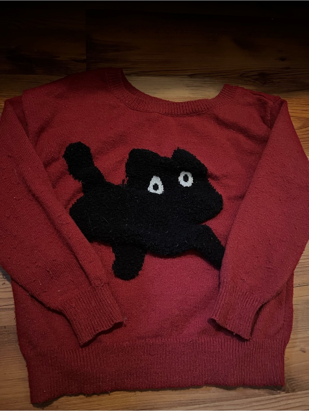 Red Women’s off shoulder Sweater with Black Cat Motif